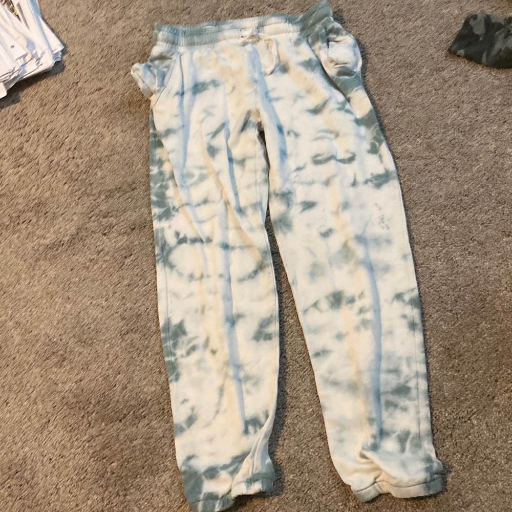 teal and white joggers